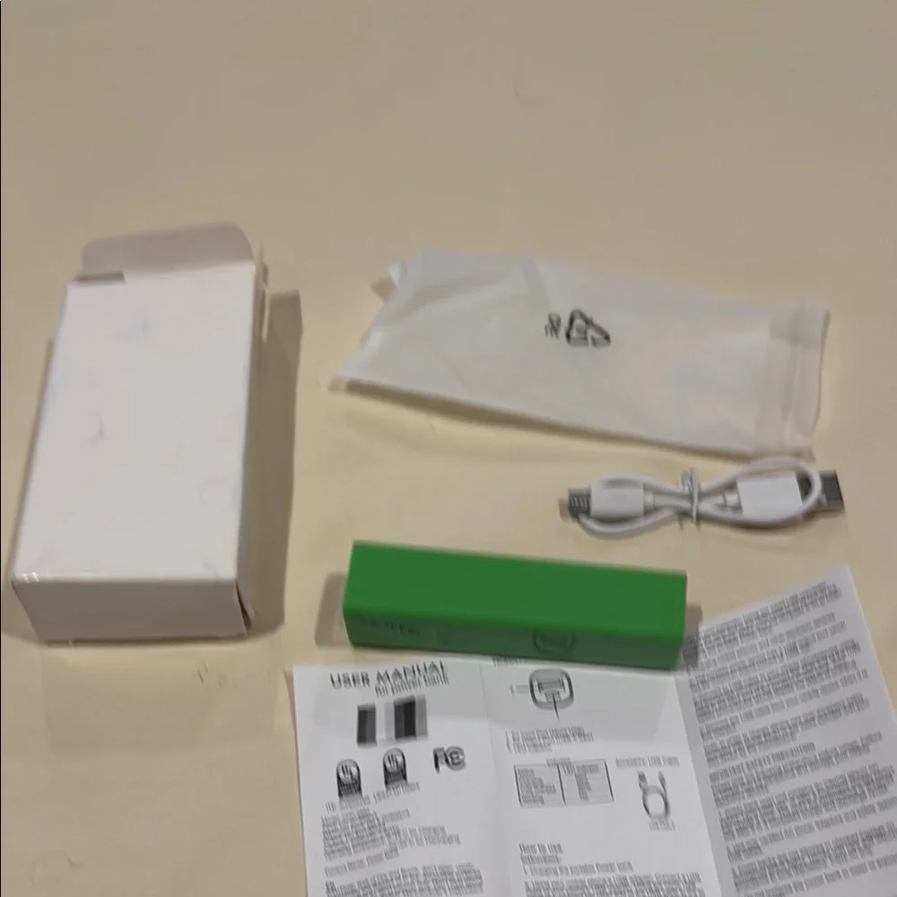 Green and White Charger with Portable Battery Pack for Cell Phones